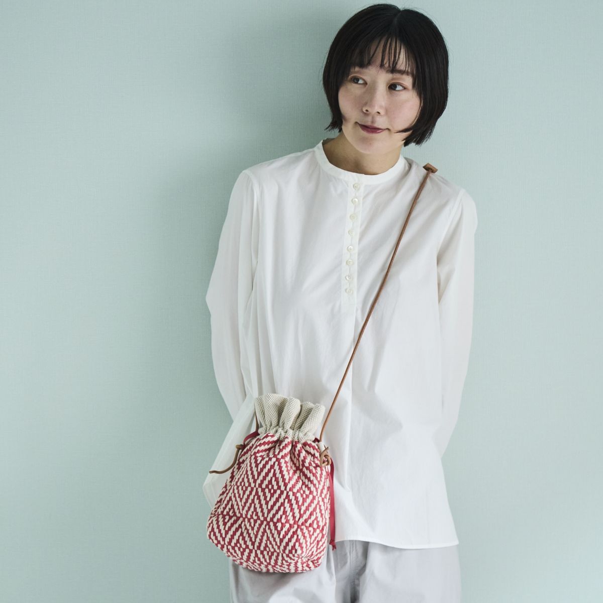 trois temps/リボン織の巾着ポシェット