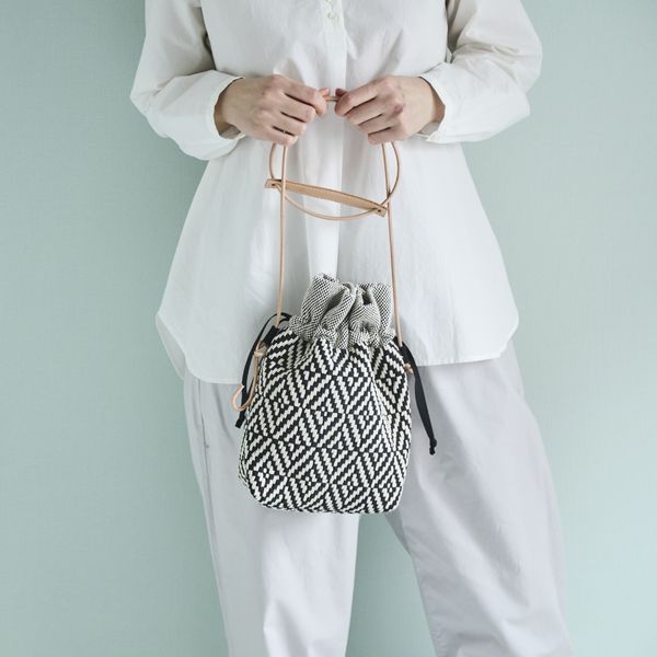 trois temps/リボン織の巾着ポシェット